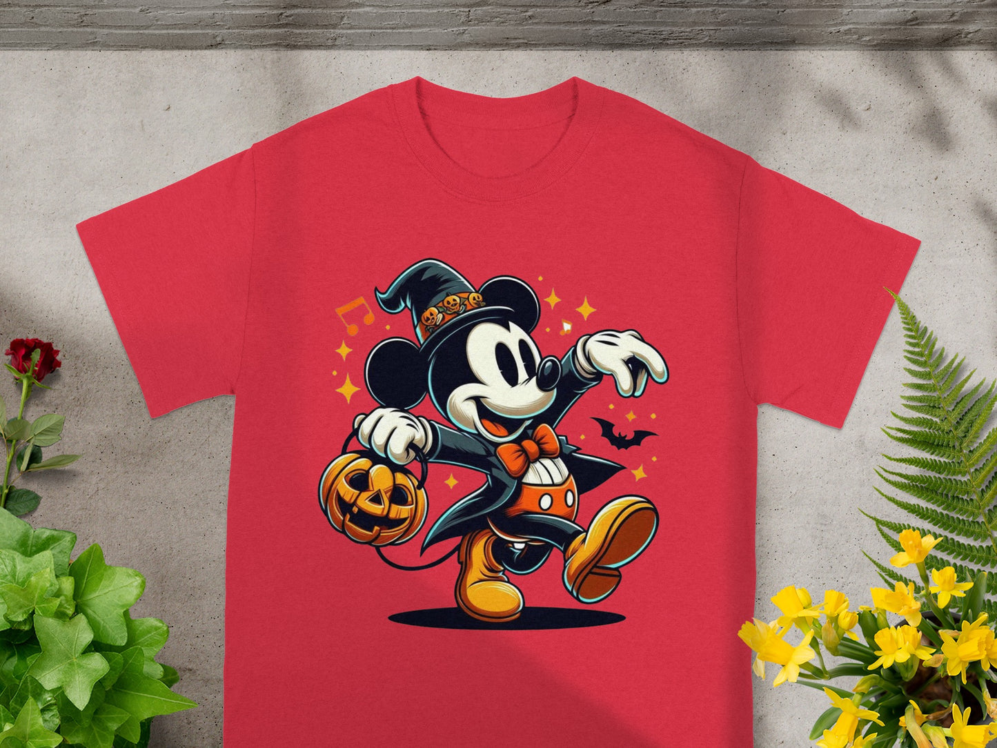 Red t-shirt with Mickey Mouse in a witch hat carrying a jack-o'-lantern.
