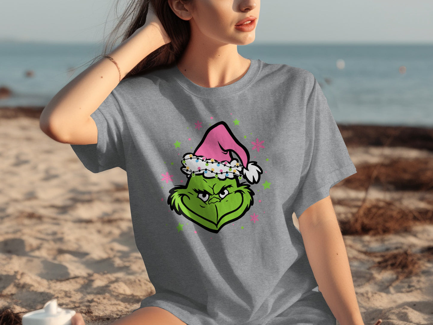 Festive Grinch Face in Pink Santa Hat T-shirt