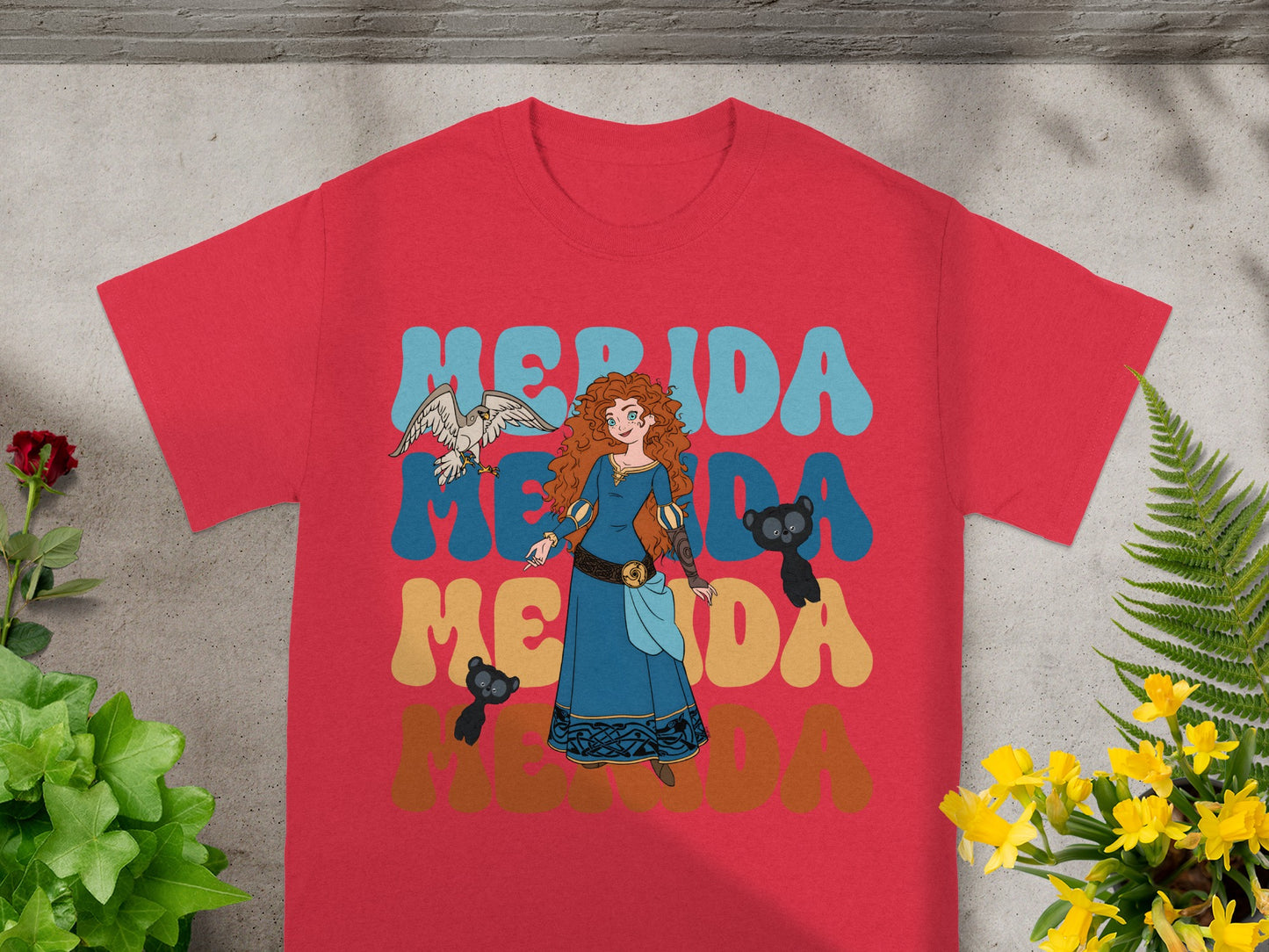 Red t-shirt with Merida from Brave and text Merida in colorful lettering.