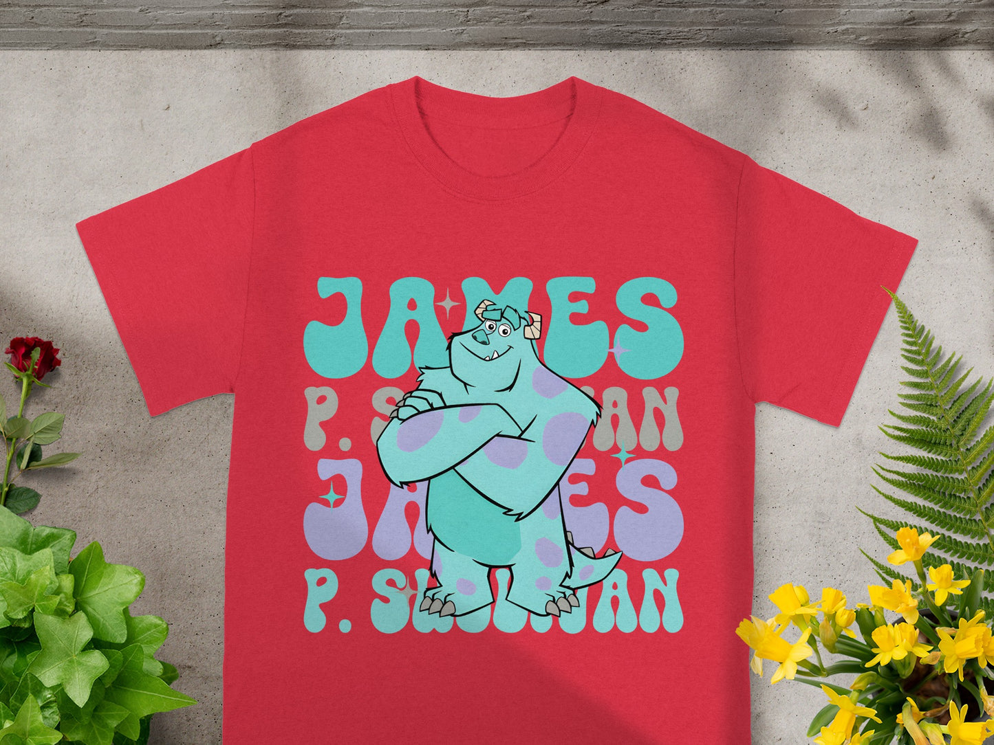 Red t-shirt with Sully from Monsters, Inc. and "James P. Sullivan" text.