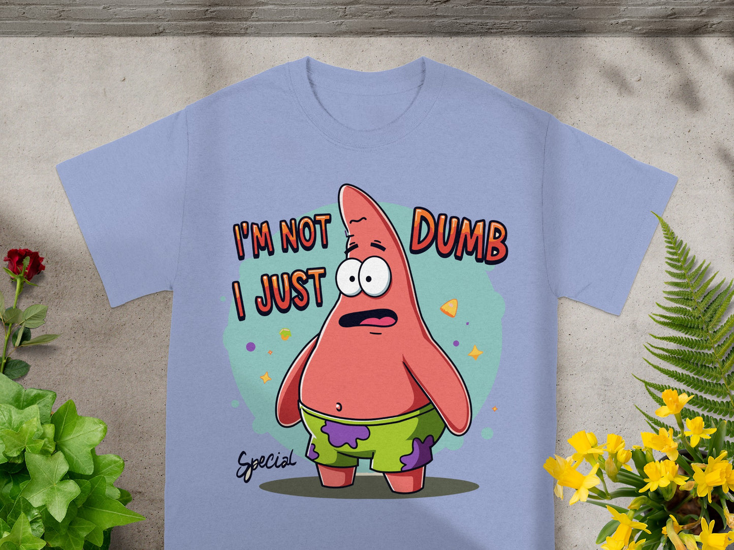 Light purple t-shirt with Patrick Star saying "I'm not dumb I just".