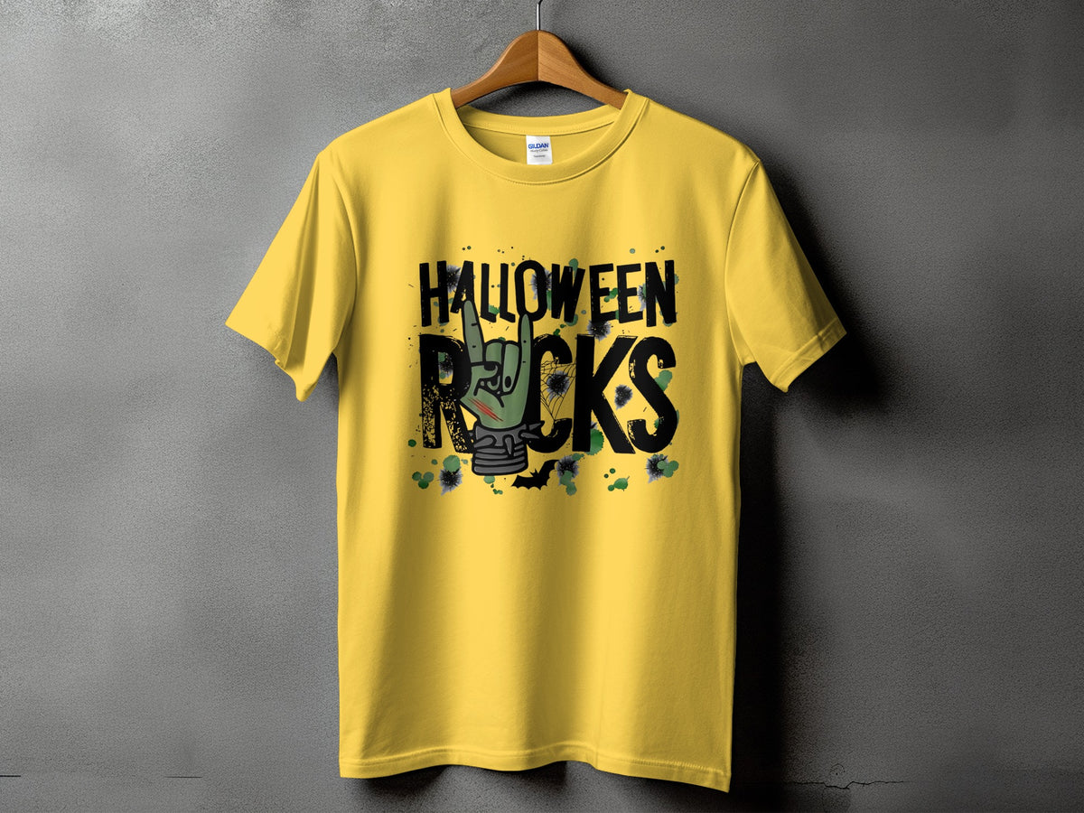 Yellow t-shirt with black text "HALLOWEEN ROCKS" and a zombie hand giving a rock-on gesture.