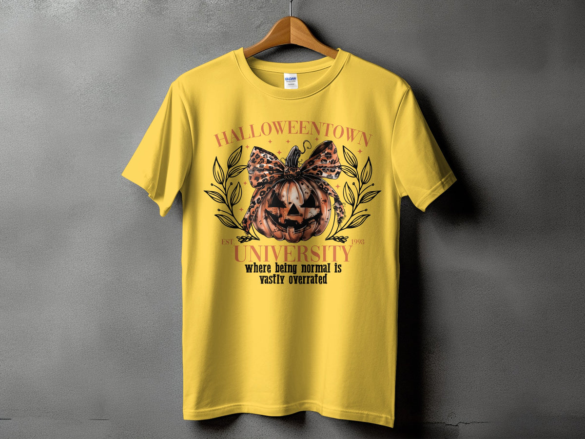 Yellow t-shirt with "Halloweentown University" graphic and pumpkin.