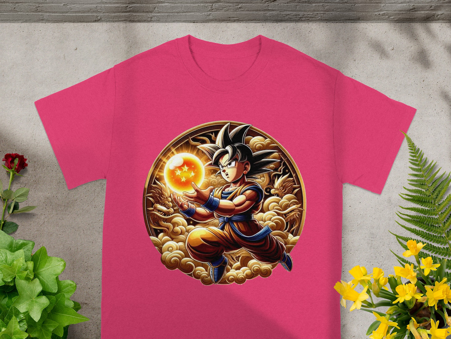 Goku holding a power ball with golden dragons, pink t-shirt product shot.