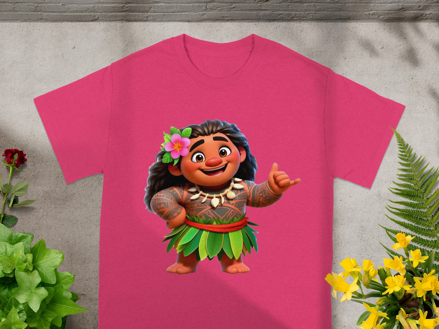 Moana character graphic on a pink t-shirt with tropical plants.