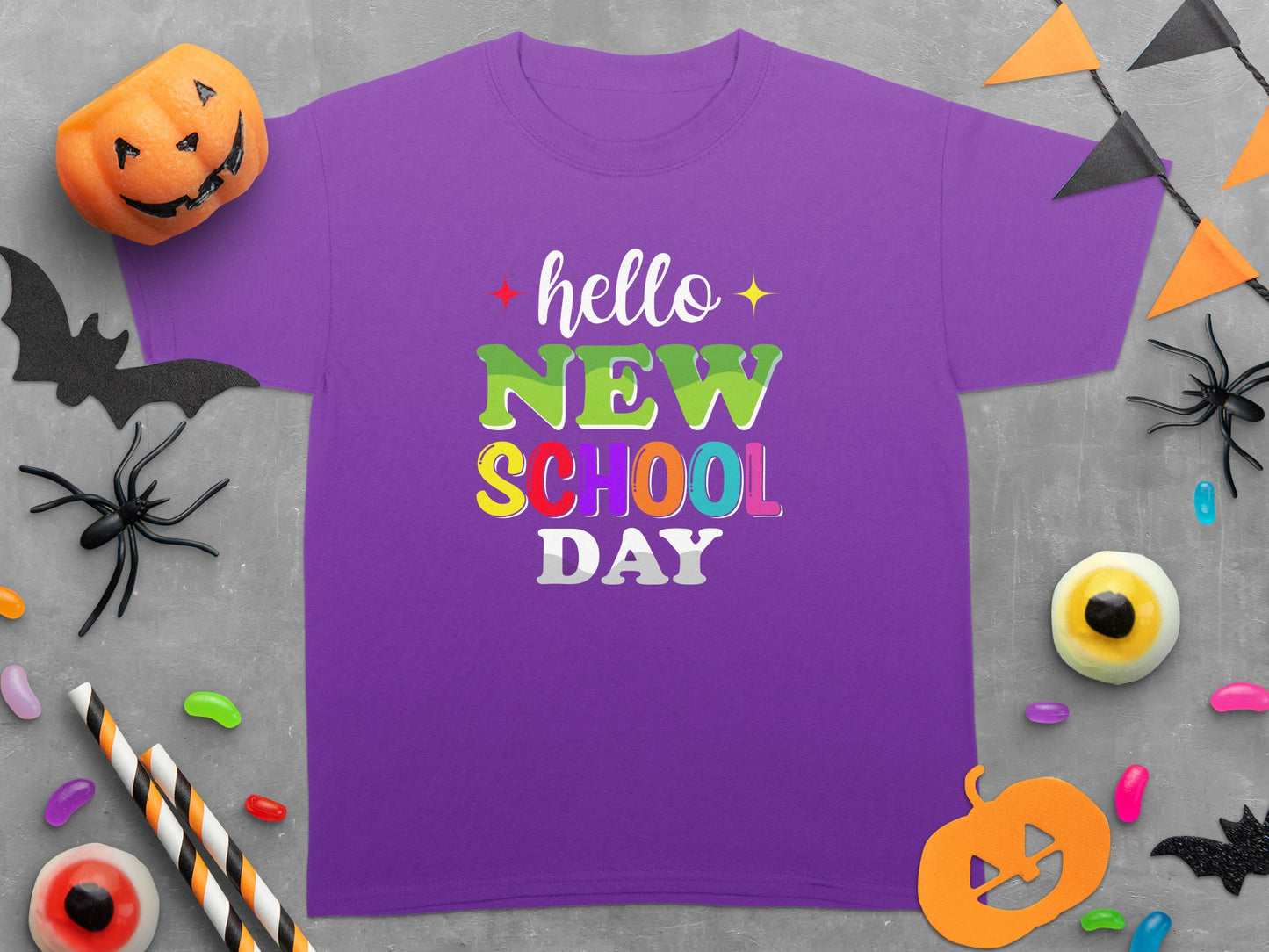 Purple t-shirt with "hello NEW SCHOOL DAY" text in colorful lettering.