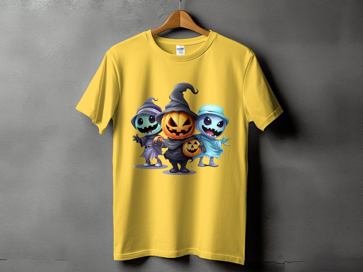 Yellow t-shirt with three cute Halloween characters: a pumpkin, a witch, and a ghost.