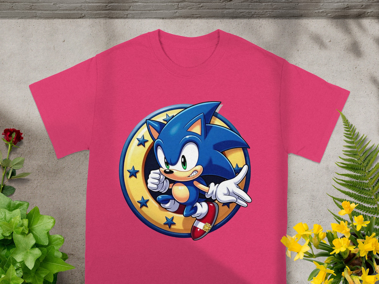 Pink t-shirt with Sonic the Hedgehog in a gold ring.