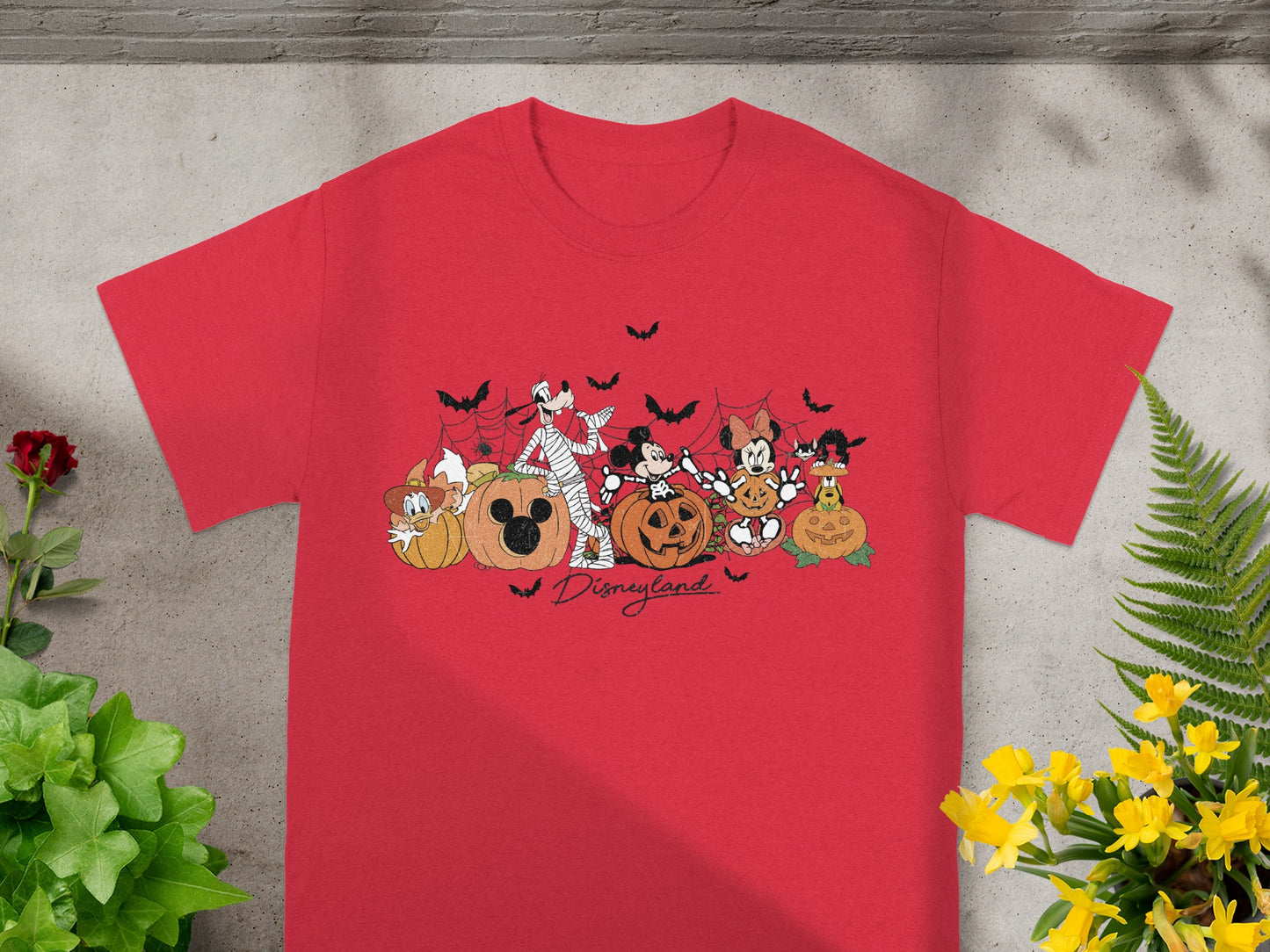 Red t-shirt with Halloween Disney characters and Disneyland text.