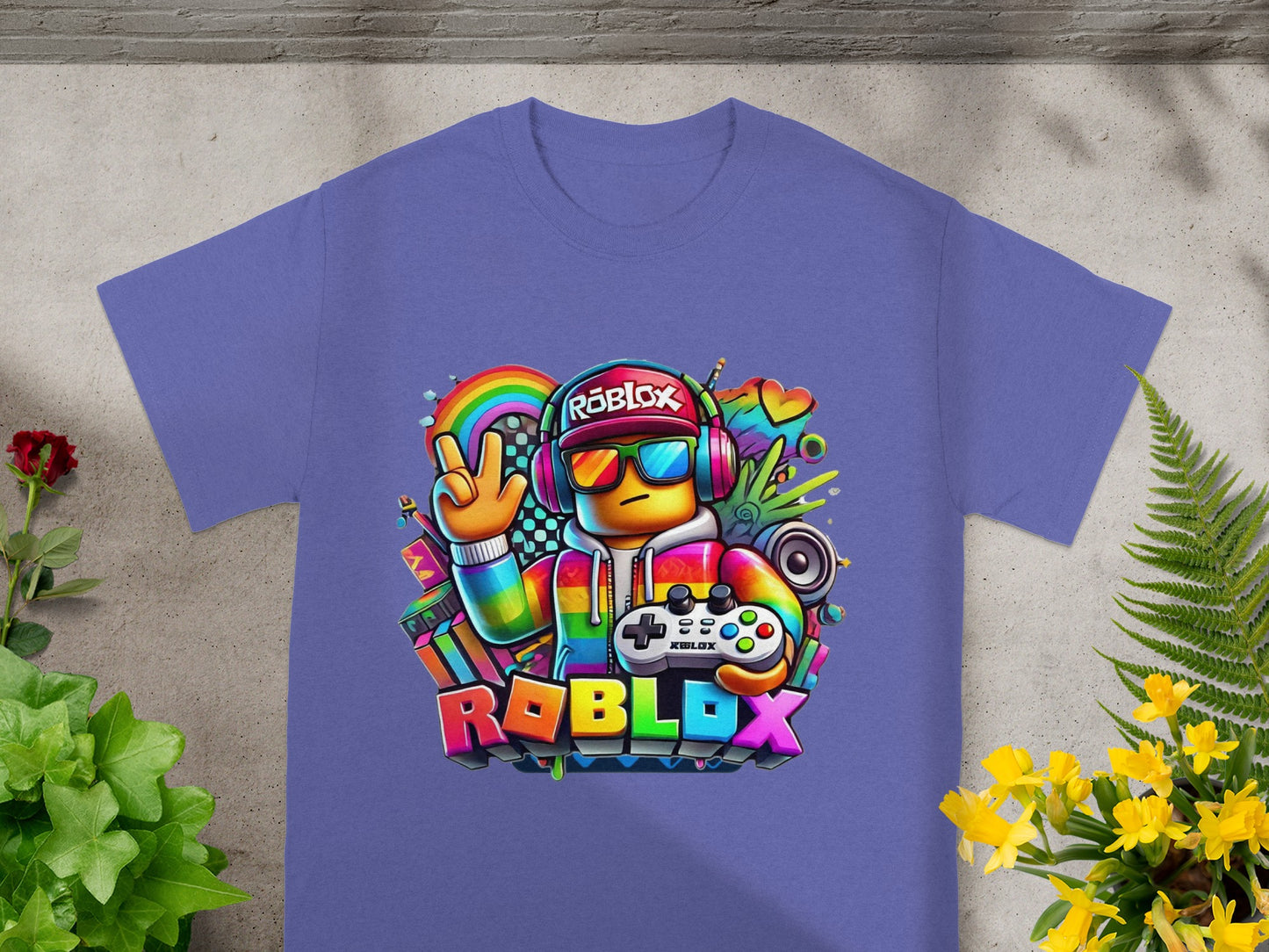 Roblox graphic t-shirt featuring a character with headphones and controller.
