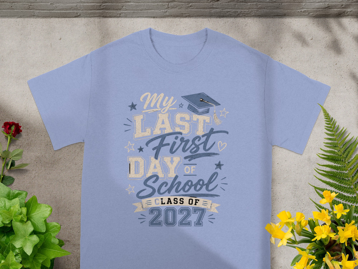 Light blue t-shirt with "My Last First Day of School Class of 2027" graphic.