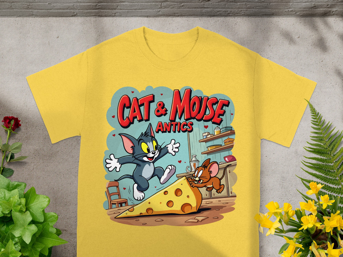 Yellow t-shirt with Tom and Jerry cartoon design.