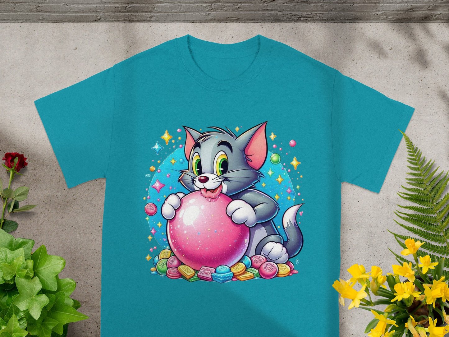 Cartoon cat holding a pink glittery ball, surrounded by candies and sparkles.