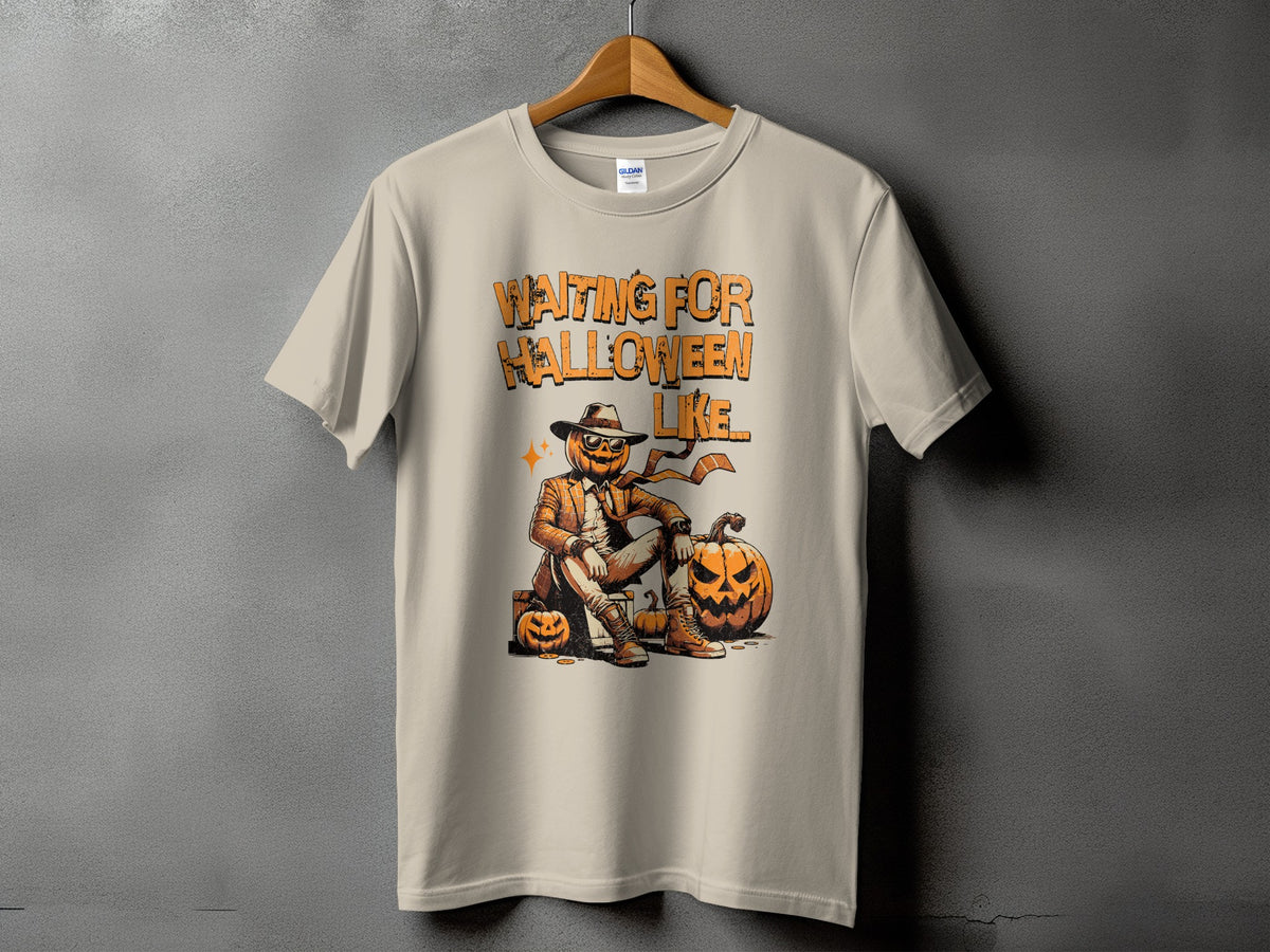 T-shirt with graphic of pumpkin character and text "Waiting For Halloween Like".