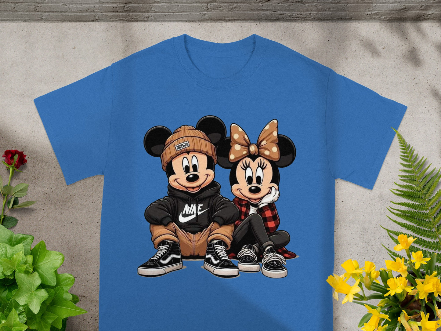 Mickey and Minnie Mouse in casual clothing, sitting together.