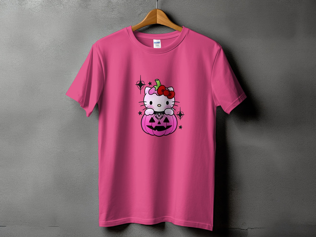 Pink t-shirt with Hello Kitty sitting in a Halloween pumpkin graphic.