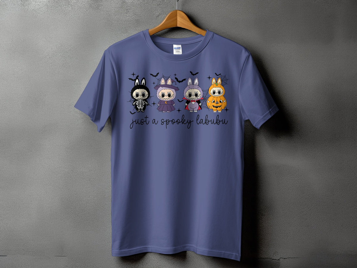 Four Halloween-themed cartoon animals on a purple t-shirt with text "just a spooky labubu".