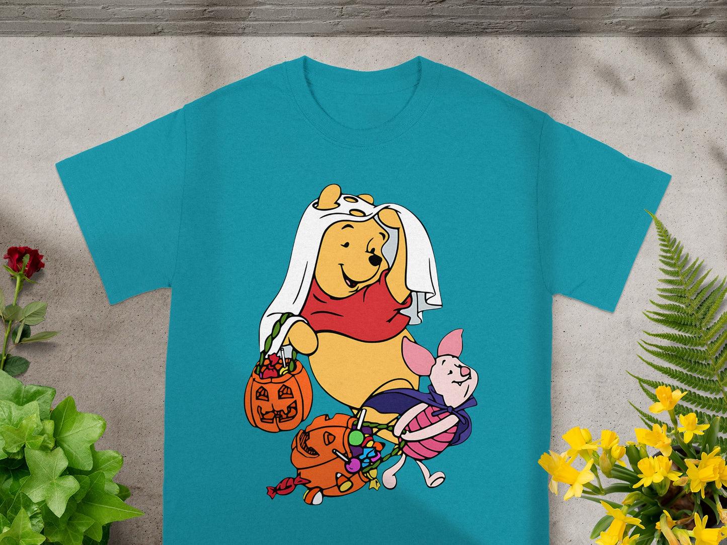 Winnie the Pooh and Piglet trick-or-treating with candy and pumpkins.