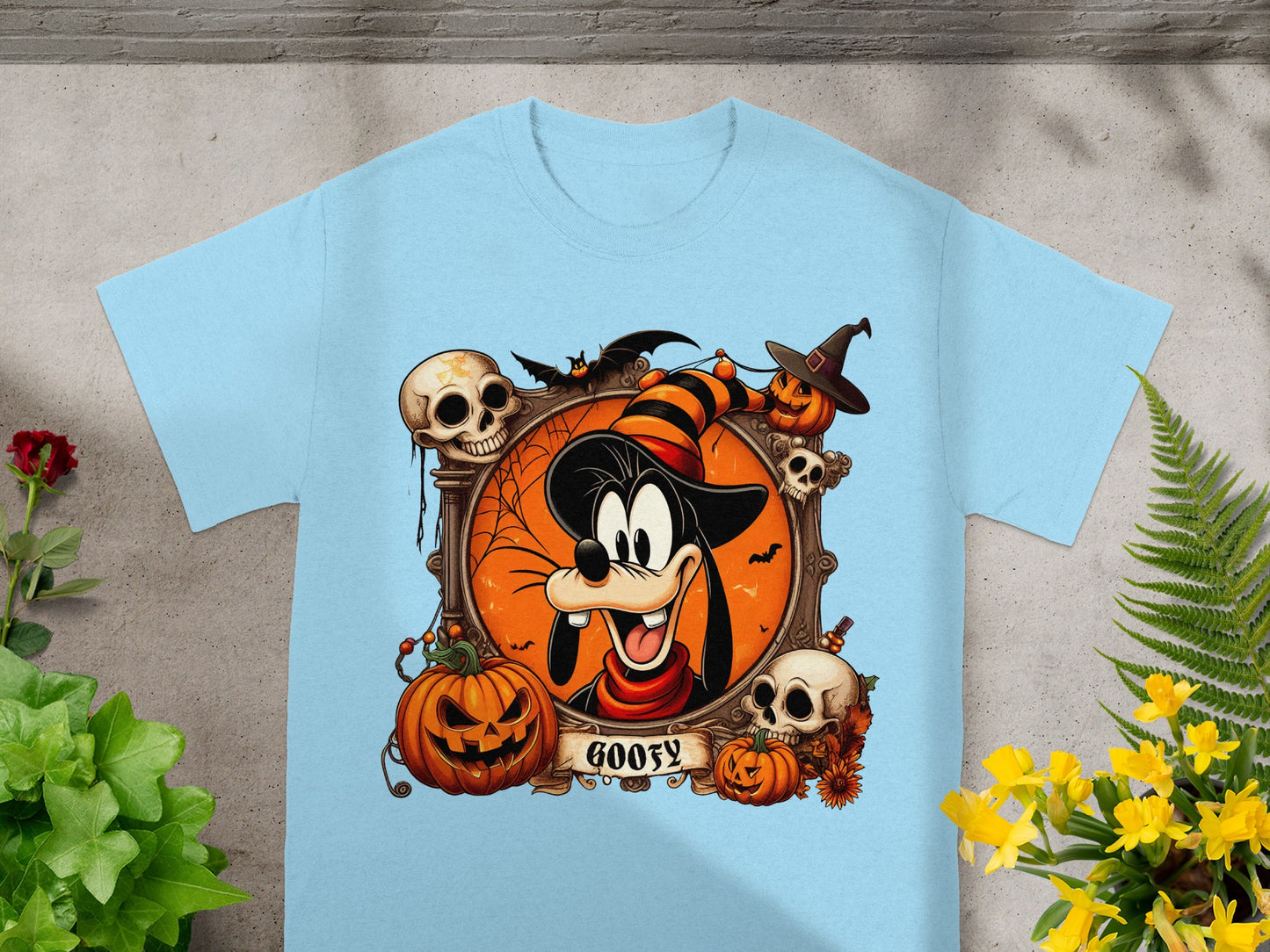 Goofy Halloween graphic with pumpkins, skulls, bats, and text "Goofy"