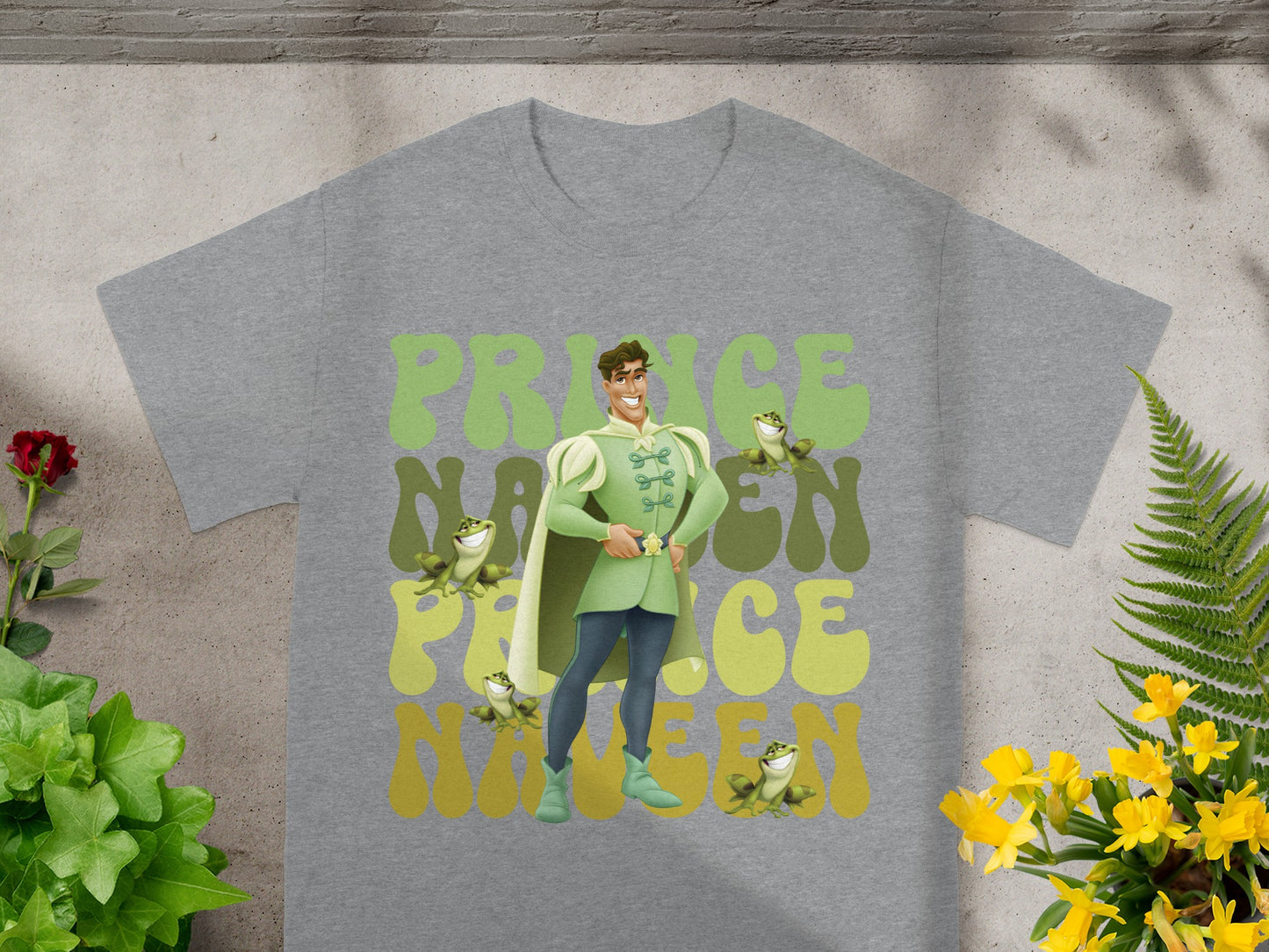 Grey t-shirt with "Prince Charming Nineteen" graphic featuring Prince Charming and frogs.