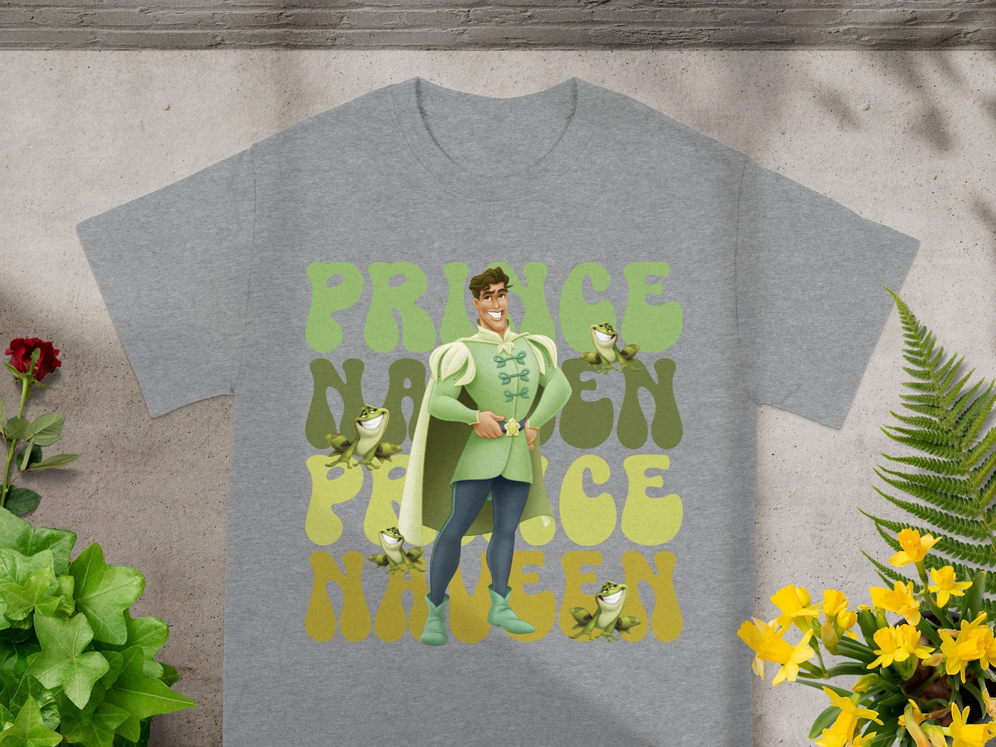 Grey t-shirt with "Prince Charming Nineteen" graphic featuring Prince Charming and frogs.