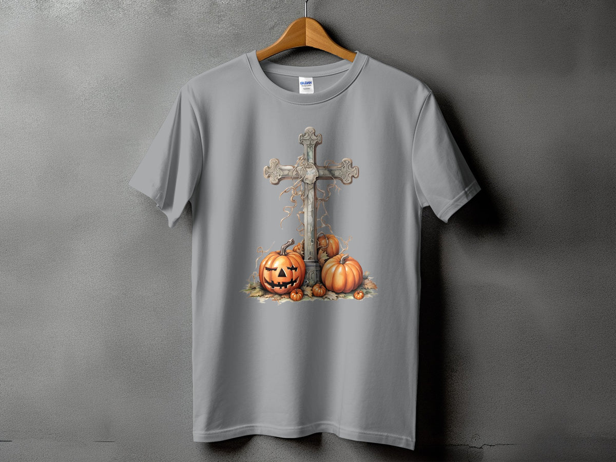 Gray t-shirt with a graphic of a cross, pumpkins, and fall leaves.