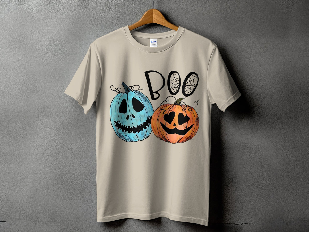 Light brown t-shirt with "BOO" text and two cartoon pumpkins.