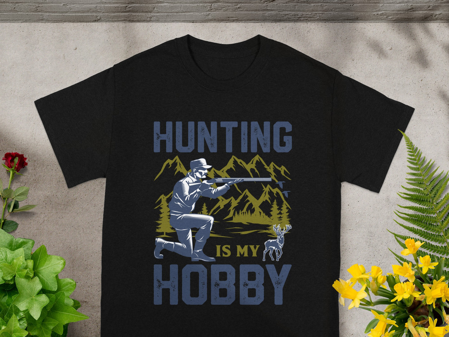 Black t-shirt with "Hunting is My Hobby" text and hunter graphic.