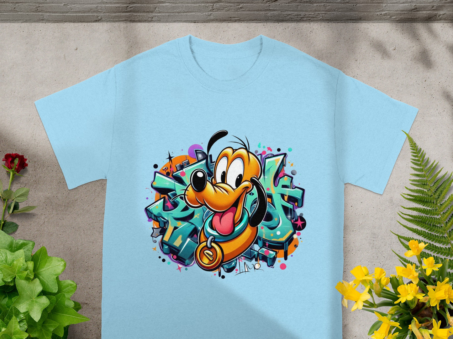 Light blue t-shirt featuring cartoon dog Pluto graffiti graphic.