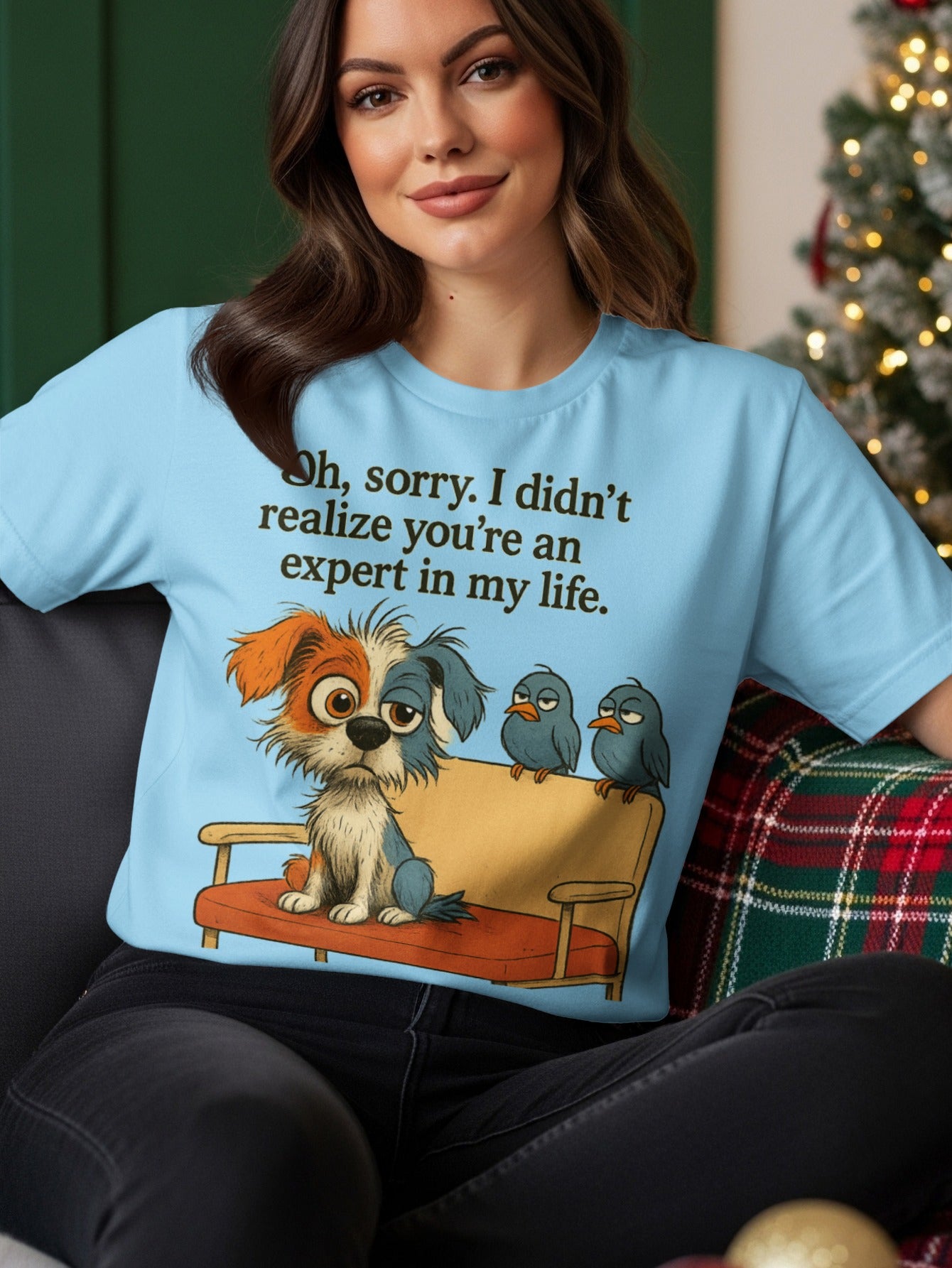 Light blue t-shirt with a dog and birds on a couch with text "Oh, sorry. I didn't realize you're an expert in my life."