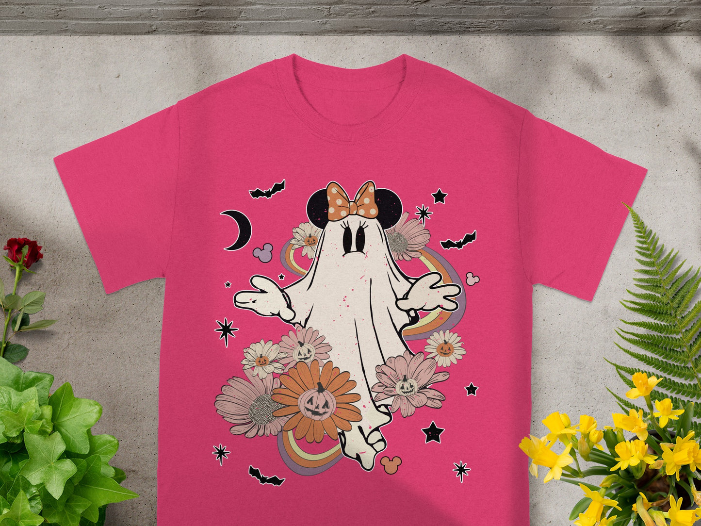 Pink t-shirt with Halloween ghost, flowers, bats, moon, and rainbows.