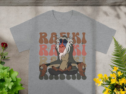 Rafiki meditating on a gray t-shirt.