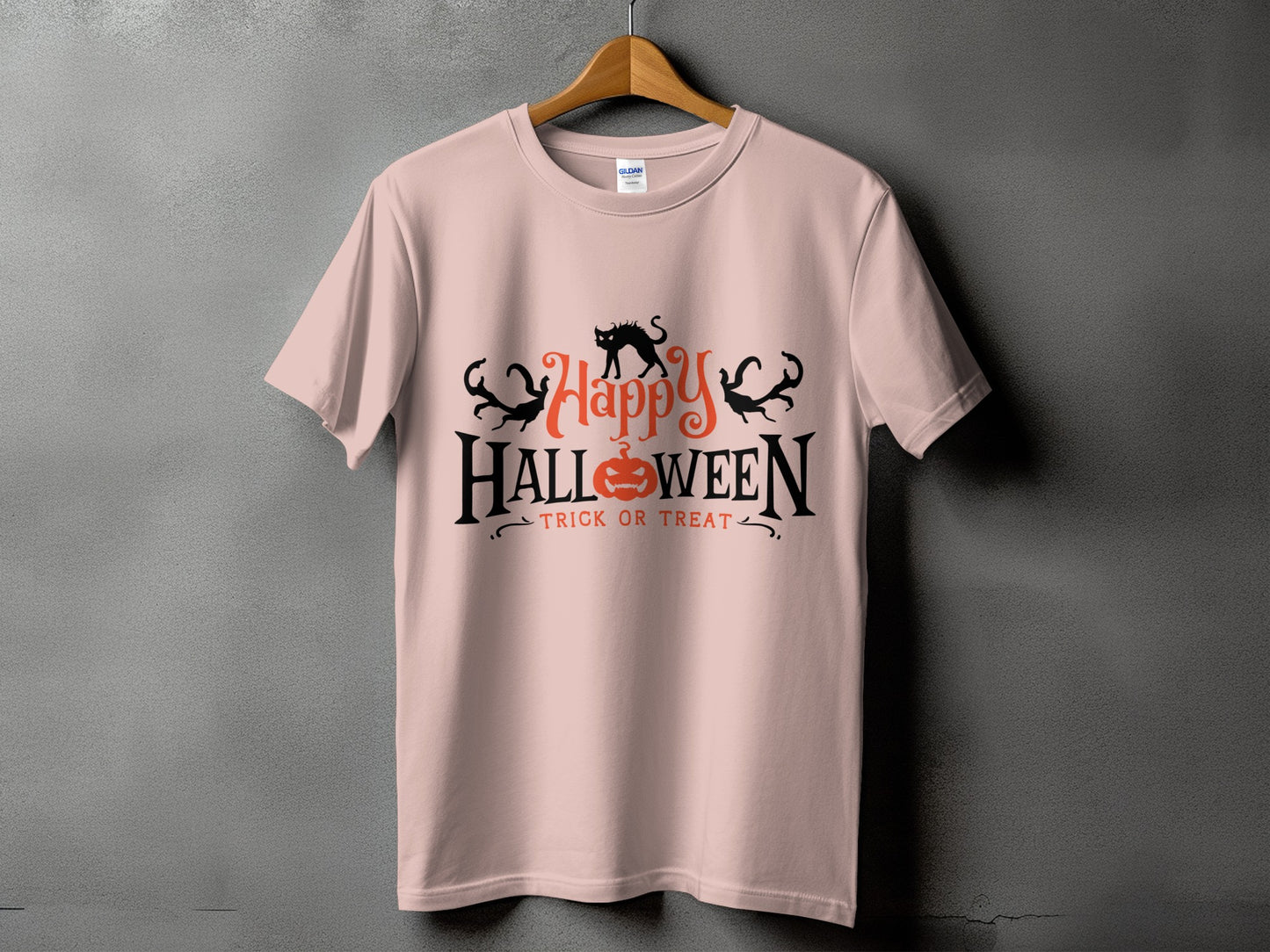 Pink t-shirt with "Happy Halloween Trick or Treat" text and Halloween graphics.