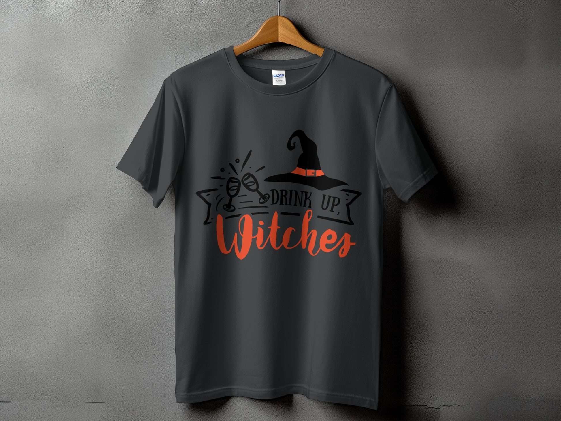 Dark gray t-shirt with "Drink Up, Witches" Halloween graphic.