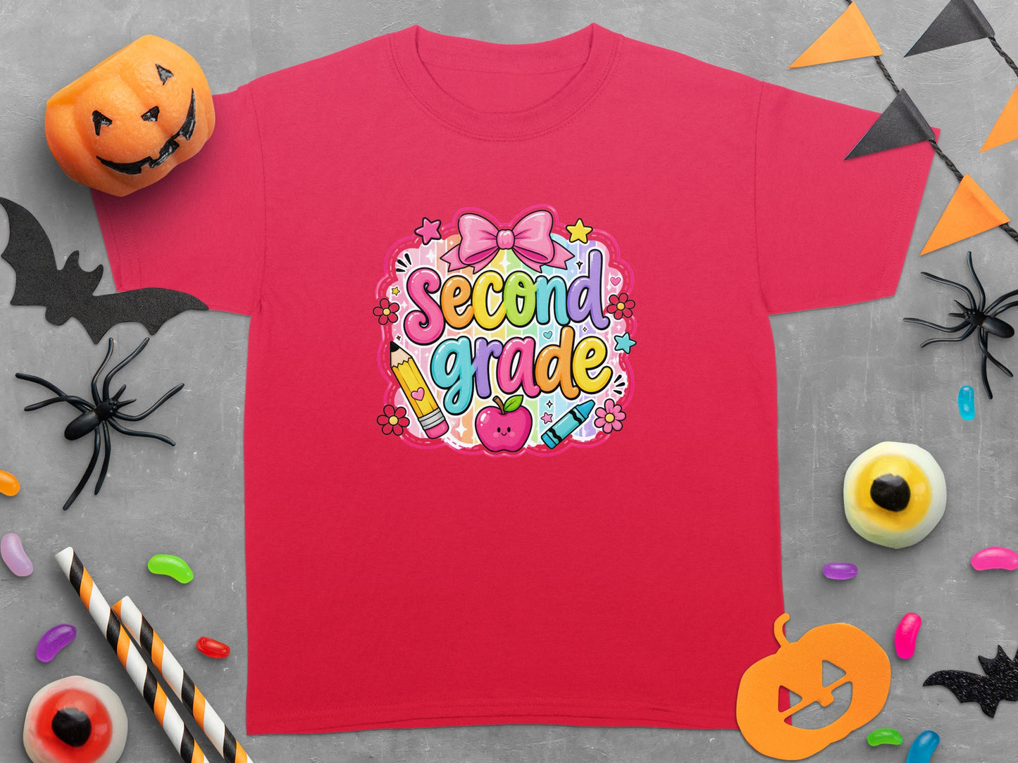 Red t-shirt with colorful "Second Grade" graphic featuring school supplies and Halloween decorations.