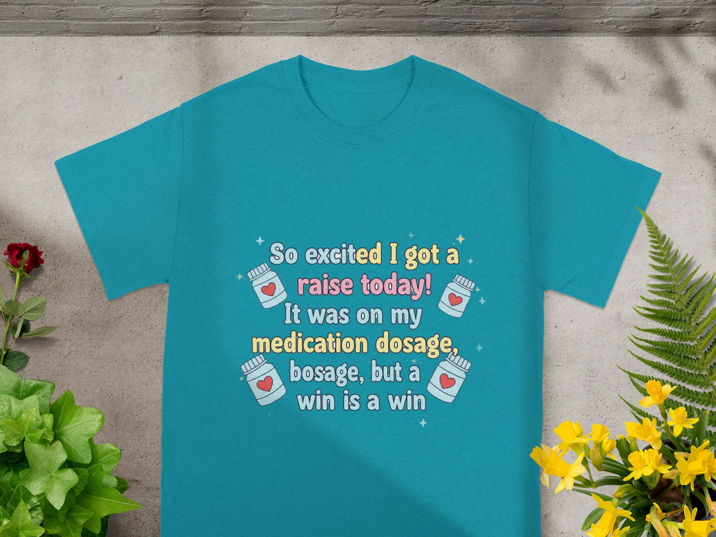 Teal t-shirt with text "So excited I got a raise today!"