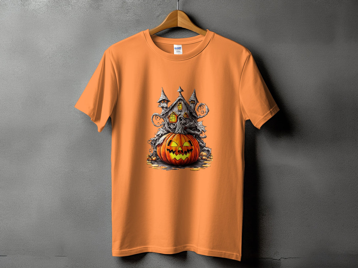 Orange t-shirt with Halloween graphic of a spooky house and jack-o'-lantern.
