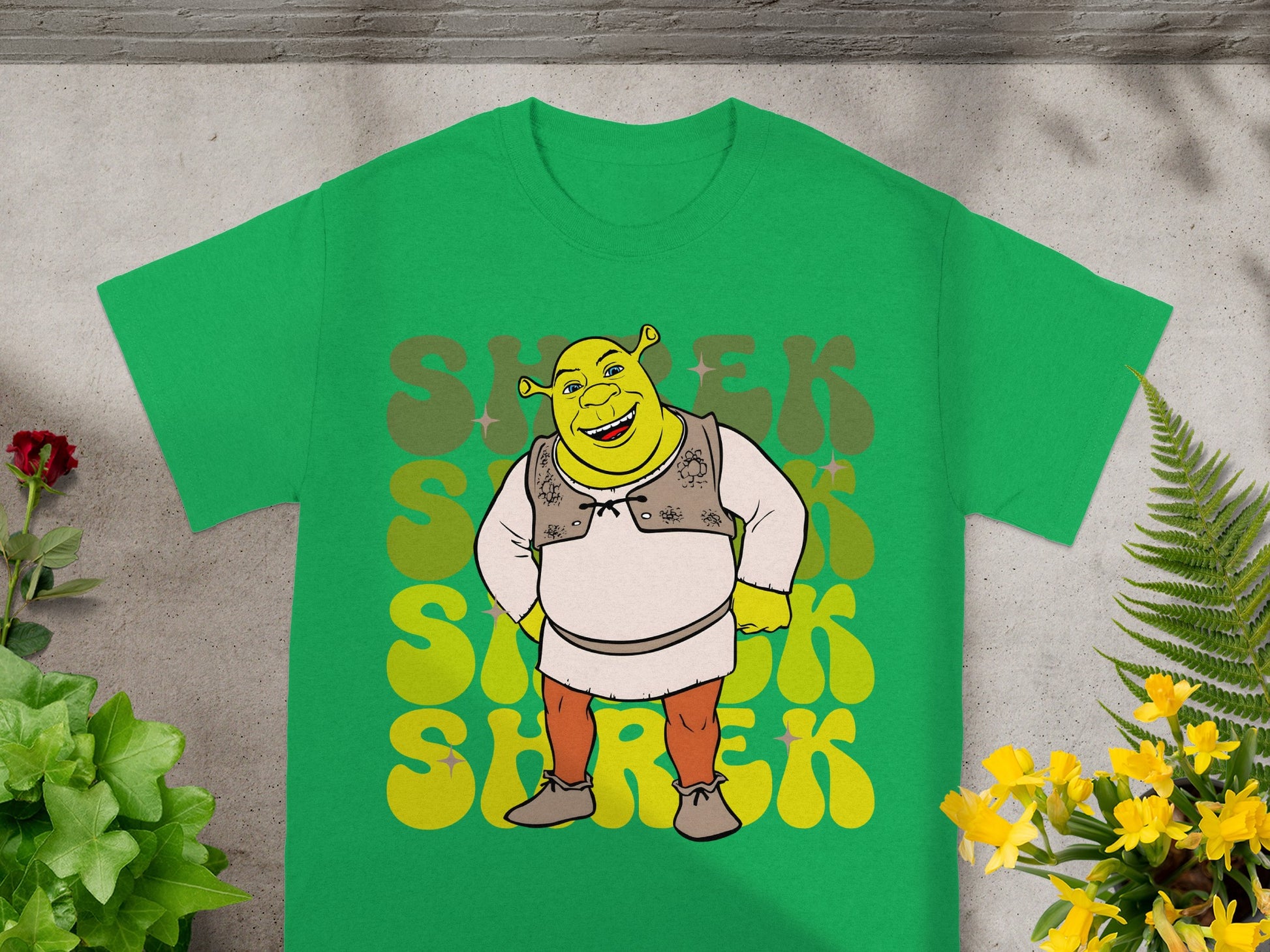 Green t-shirt with Shrek graphic and "Shrek" text.