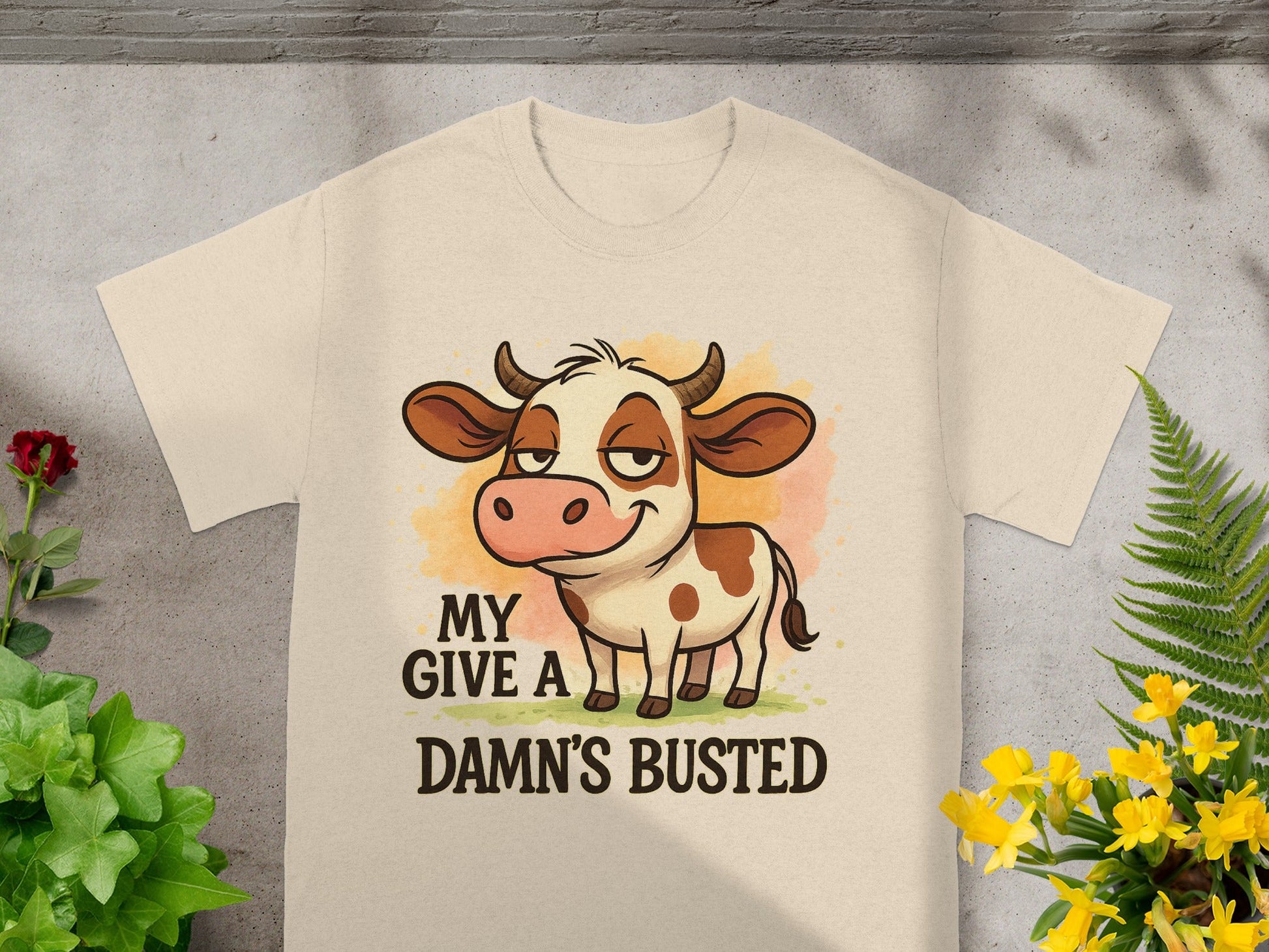 T-shirt with cartoon cow and text "My give a damn's busted."