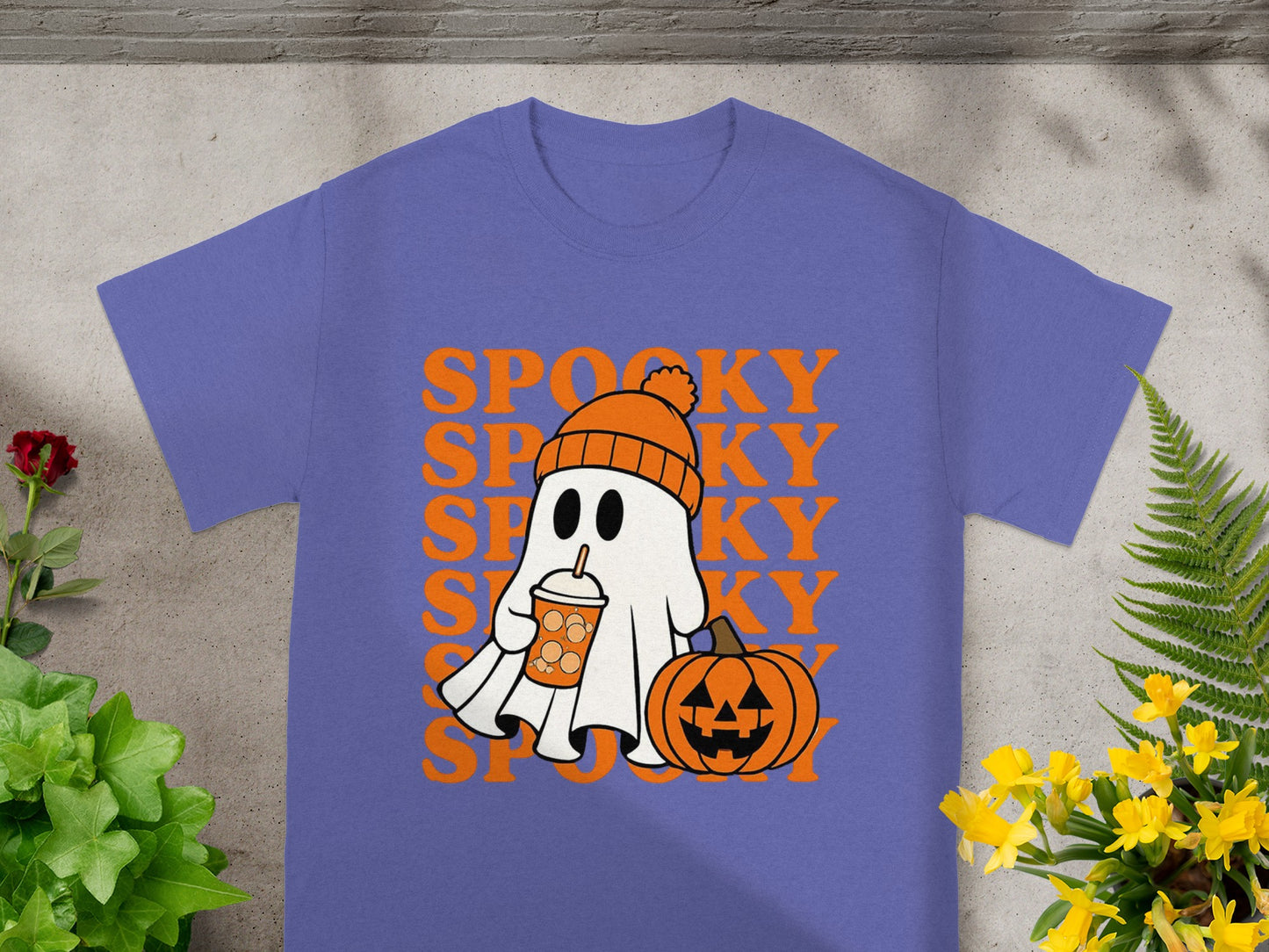 Purple t-shirt with a ghost, pumpkin, and "SPOOKY" text graphic.