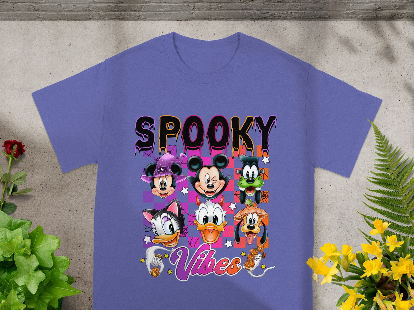 Purple t-shirt with "SPOOKY Vibes" text and Disney characters in Halloween costumes.