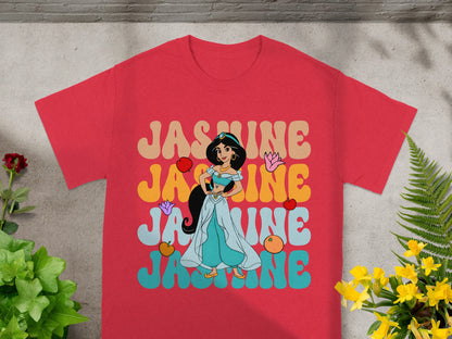 Red t-shirt with "JASMINE" in colorful retro font and character graphic.