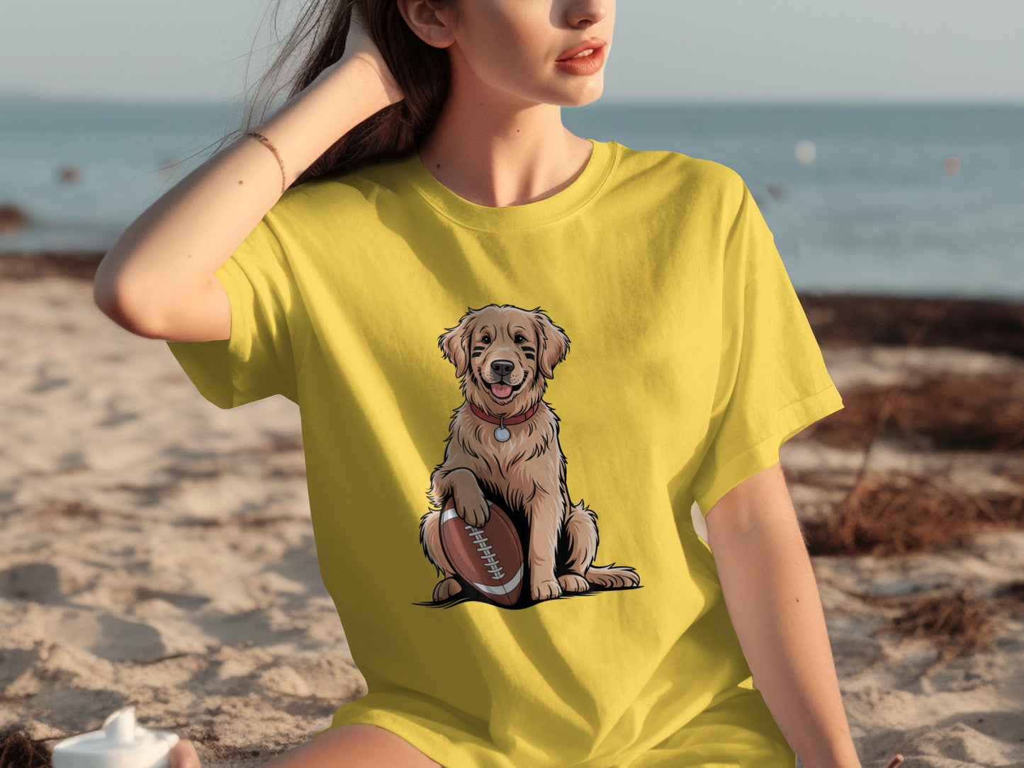 Adorable Golden Retriever with Football Graphic Tee