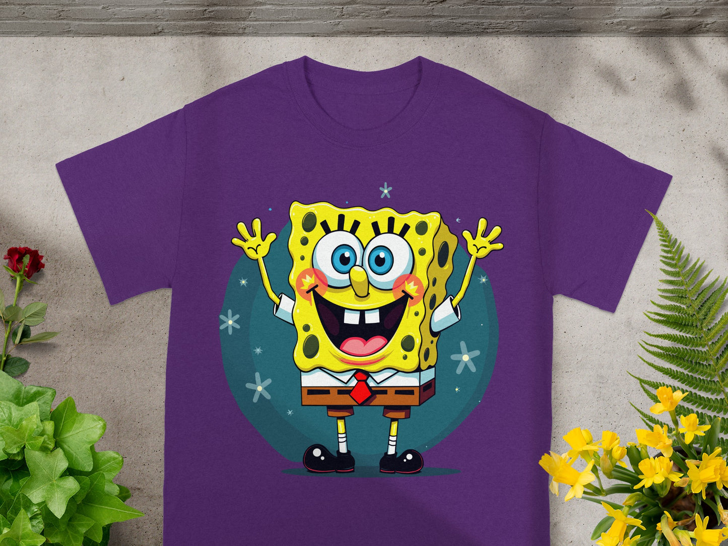 SpongeBob SquarePants smiling with arms raised on a purple t-shirt.