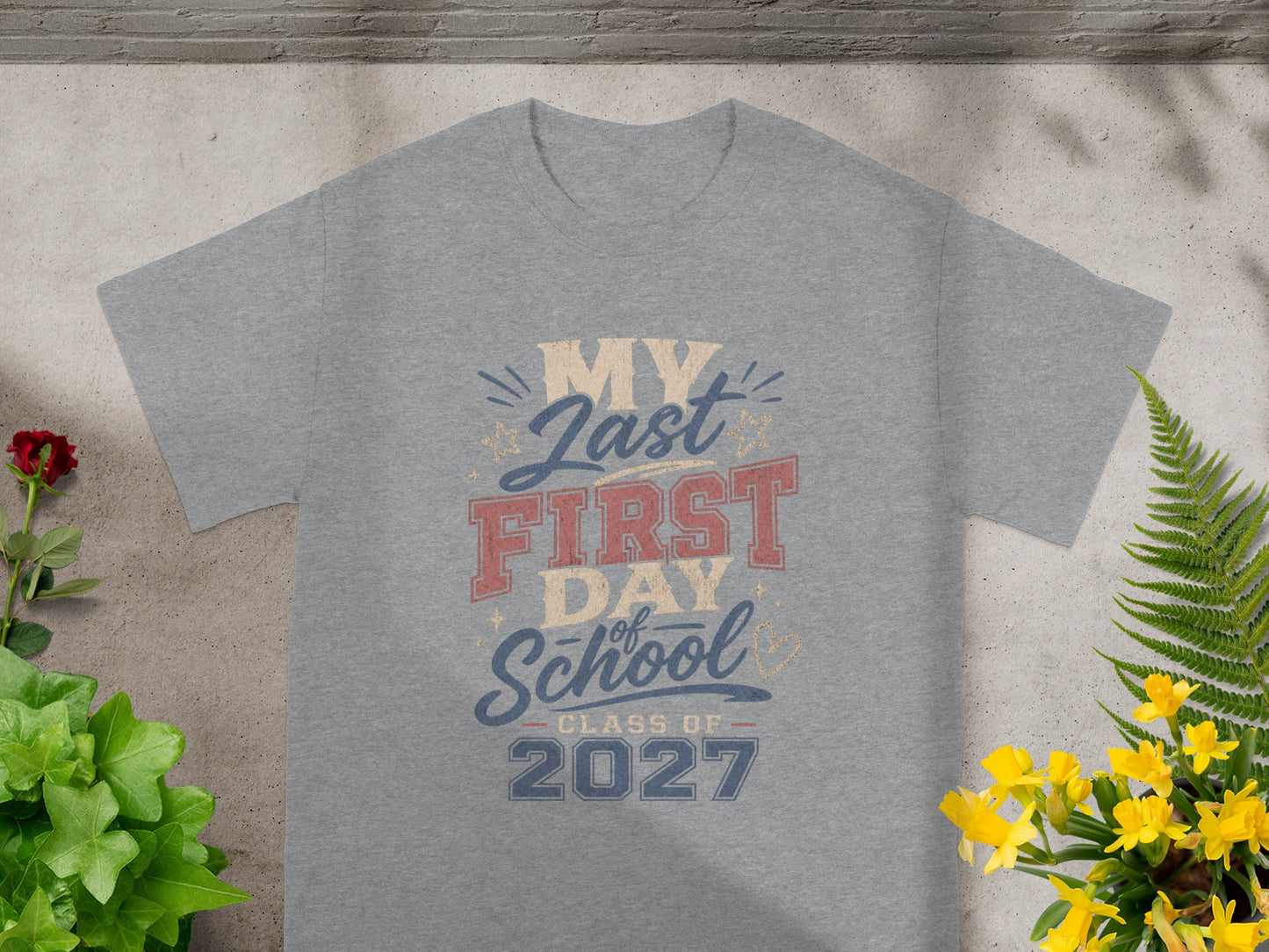Grey t-shirt with "My Last First Day of School Class of 2027" text design.