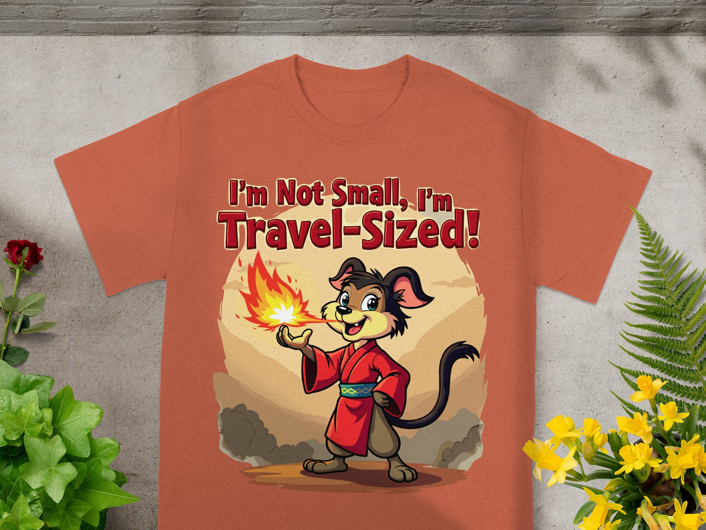 Cartoon dog in kimono breathes fire with text "I'm Not Small, I'm Travel-Sized!"
