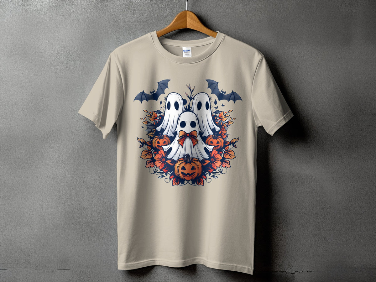 Tan t-shirt with Halloween ghosts, pumpkins, bats, and flowers graphic.