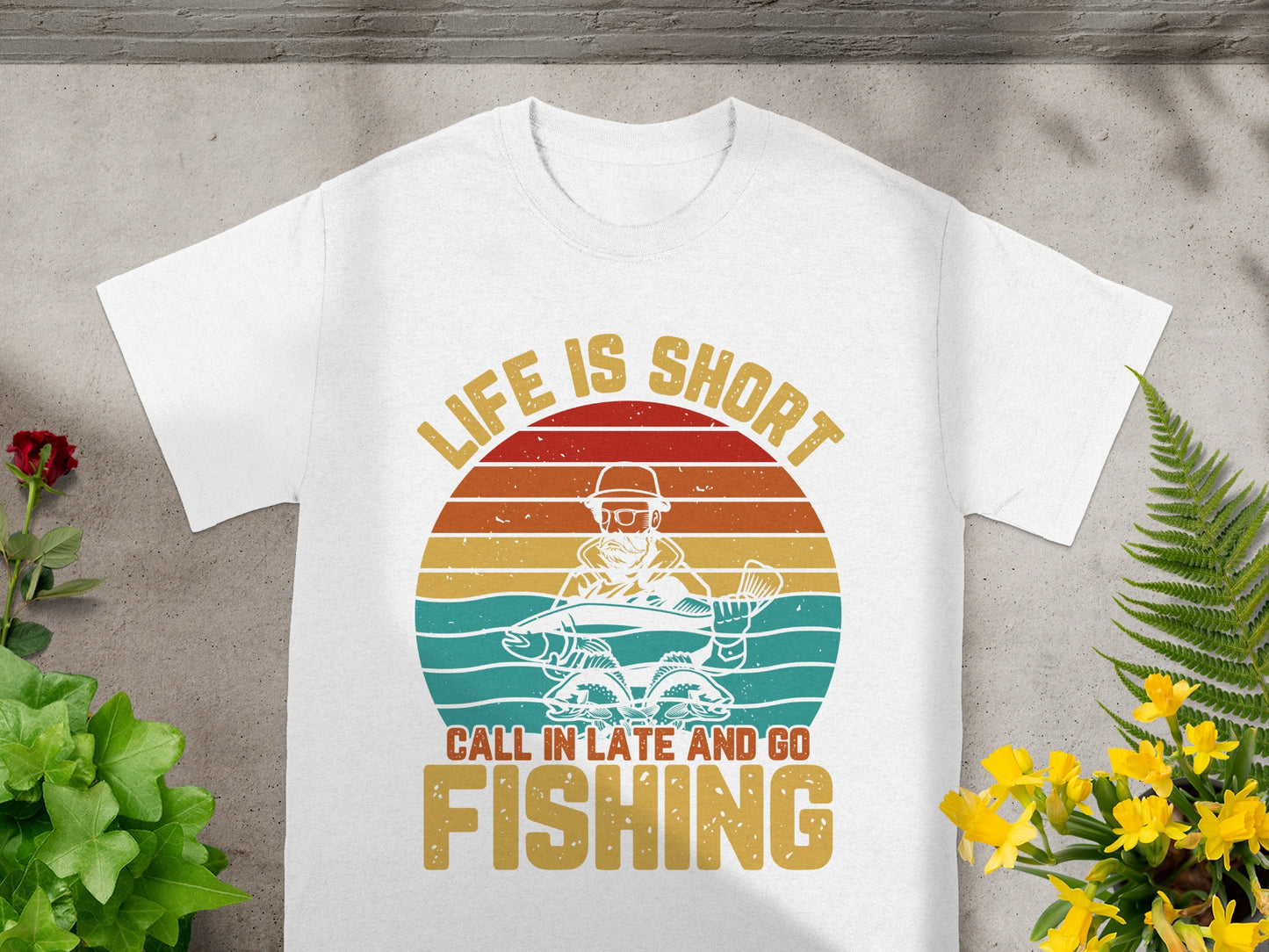 White t-shirt with "Life is Short Call In Late and Go Fishing" graphic.