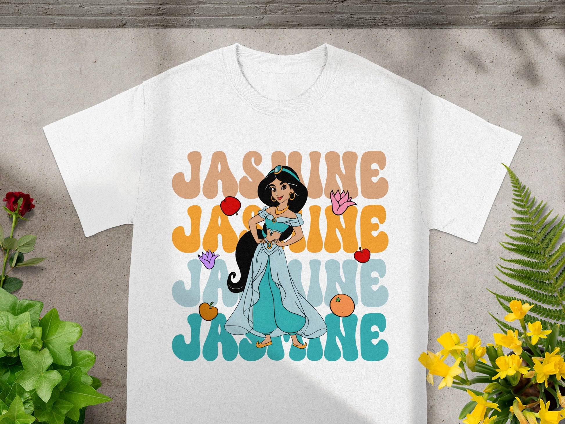 Princess Jasmine on a white t-shirt with "Jasmine" text in colorful letters.