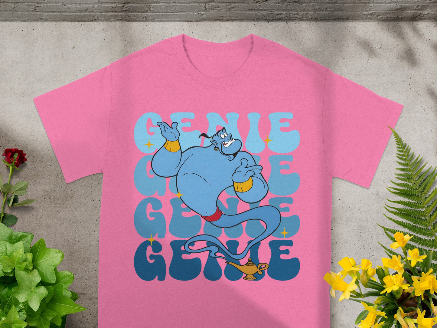 Pink t-shirt with "Genie" text and Disney's Genie character.